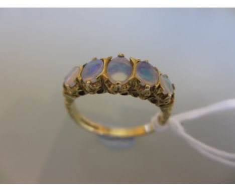 9ct Gold five stone opal carved half hoop ring