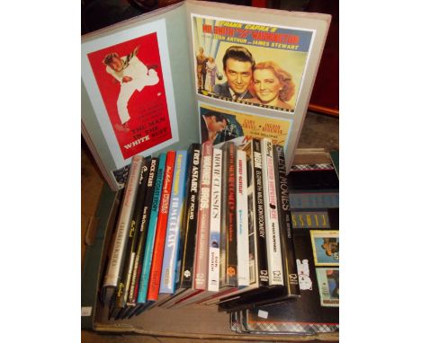 Box containing a quantity of various film books and five scrapbooks of prints of movie posters etc