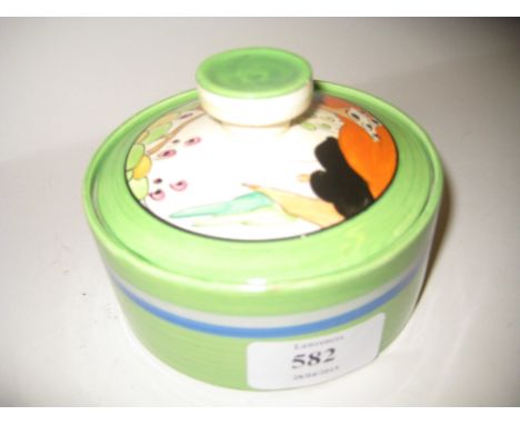 Clarice Cliff Bizarre circular preserve pot and cover, the cover painted in Secrets pattern