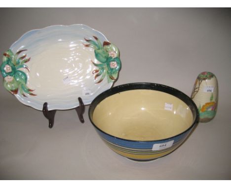Clarice Cliff Bizarre bowl with painted decoration in horizontal bands, 22cms diameter (losses to paint) together with a Clar