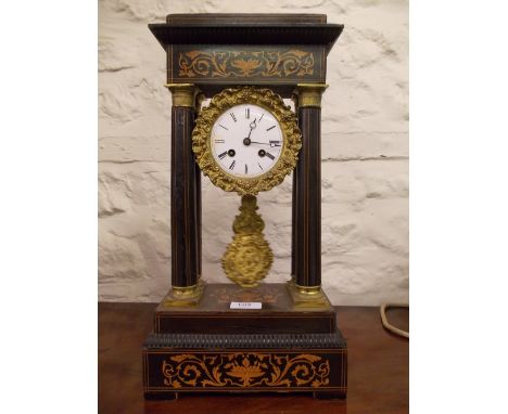 19th Century French ebonised marquetry inlaid gilt metal mounted portico clock, the enamel dial with Roman numerals and two t