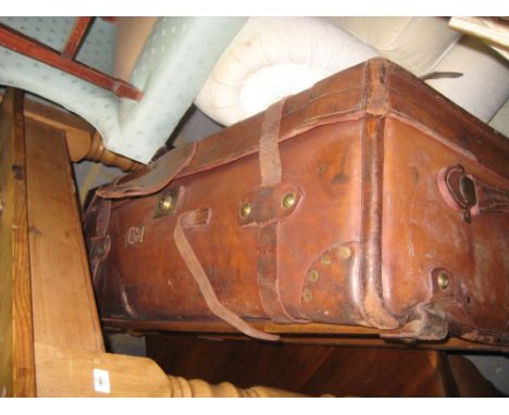 19th Century leather steamer trunk with original straps and fragments of some labels
