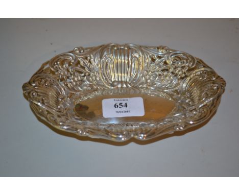 Sheffield silver trinket dish with oval floral embossed design