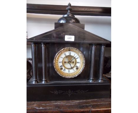 19th Century black slate dome top mantel clock with two train movement striking on a gong, the dial with white chapter ring, 