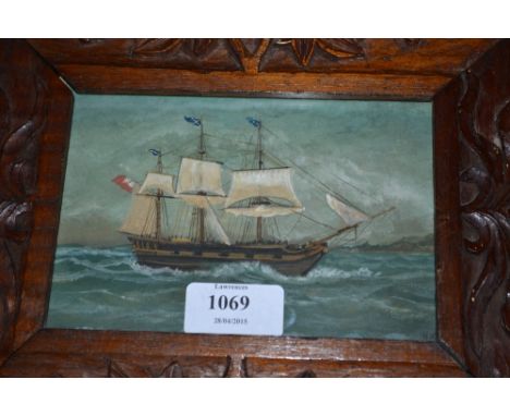 19th / 20th Century primitive school, gouache, portrait of a three masted square rigger in a carved hardwood frame, 4ins x 5.