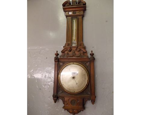 Late 19th Century carved walnut aneroid barometer / thermometer