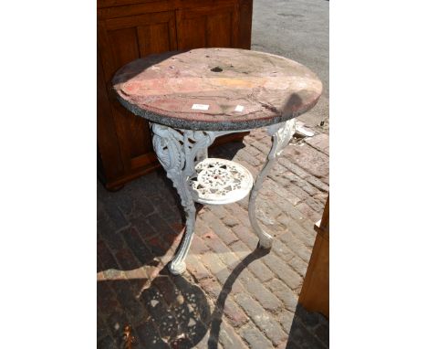 Circular white painted metal garden table