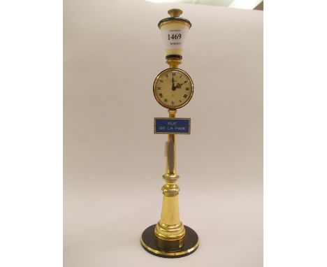 Unusual 20th Century Jaeger clock in the form of a gilt lamp post with fitted sign, Rue de la Paix, 11ins high