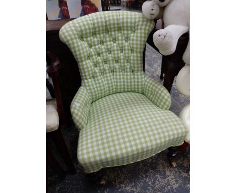 A VICTORIAN BUTTON BACK LADIES CHAIR IN GREEN CHECK UPHOLSTERY. 