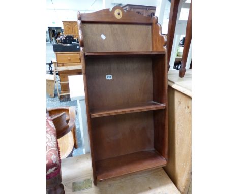 A WALL SHELF, NEST OF TABLES, AND A BEDROOM CHAIR. 