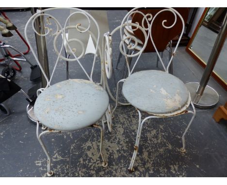 A PAIR OF WROUGHT IRON PATIO CHAIRS, TOGETHER WITH A CONSOLE TABLE BASE. 