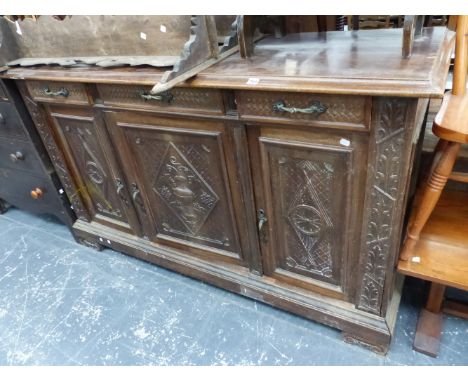 A VINTAGE WALNUT SIDE BOARD. 