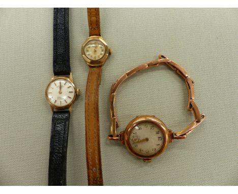 A 9ct GOLD MANUAL WOUND VINTAGE WATCH ON A 9ct GOLD EXPANDING STRAP, TOGETHER WITH TWO 9ct GOLD LADIES ROTARY WATCHES WITH LE