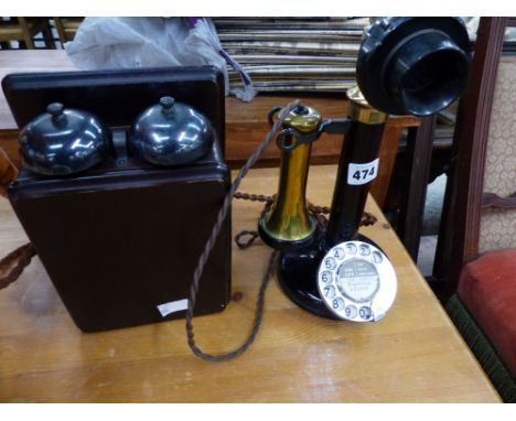 A VINTAGE STYLE CANDLE STICK TELEPHONE.