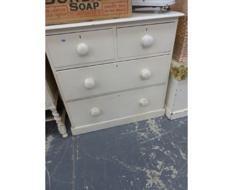 A VICTORIAN PAINTED PINE CHEST OF DRAWERS, A PINE BLANKET CHEST, WICKER LAUNDRY HAMPER, A PAINTED SIDE BOARD AND A PINE WALL 