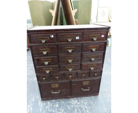 A VINTAGE SHANNON OAK FILE CABINET. 