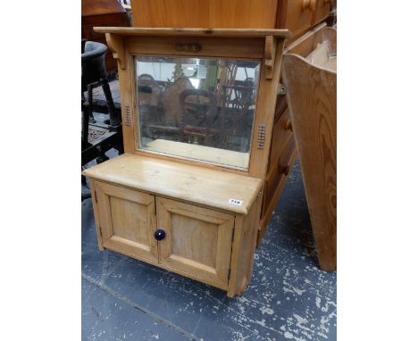 A MIRROR BACK WALL CABINET AND A PINE WALL SHELF.