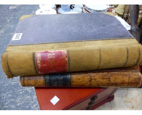 TWO VINTAGE LEATHER BOUND CASH BOOKS. 