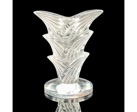 Crystal candlestick featuring a beautiful combination of frosted and clear glass inspired by the ariel roots of the Banyan tr