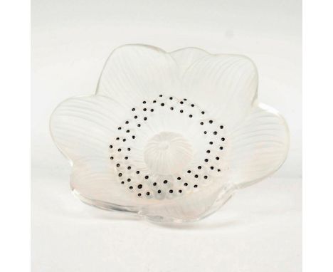 A large delicate flower in satin finish with black enamel finishes. Lalique France etched backstamp. Dimensions: 4"L x 4.25"W