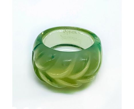 Light transparent glass with frosted foliage motif carvings. Lalique France signature on band. Ring size 8. Country of Origin