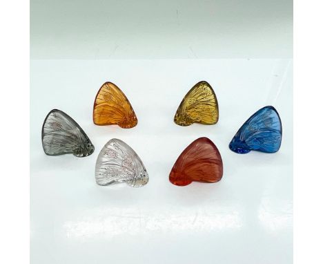 Six lovely crystal butterflies, five with metallic an enamel accents. Lalique France etched mark. Dimensions: 2"L x 0.75"W x 