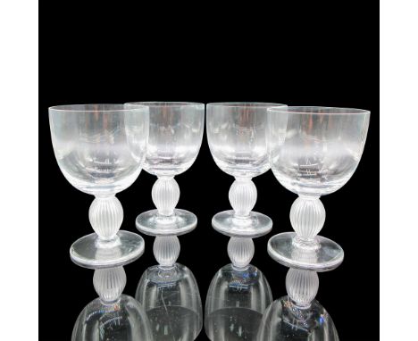 Clear body with frosted vertical ribbed stem. Lalique etched mark. Artist: Marc LaliqueDimensions: 3"L x 3"W x 4.75"HCountry 