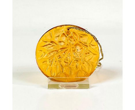 Orange colored, annual ornament chased with mistletoe pattern with a satin finish. Noel 1991 etched to rim. Lalique France et