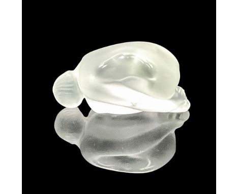 Satin figure of a nude woman faced down, and hands over feet. Lalique France etched on the underside. This item has its origi