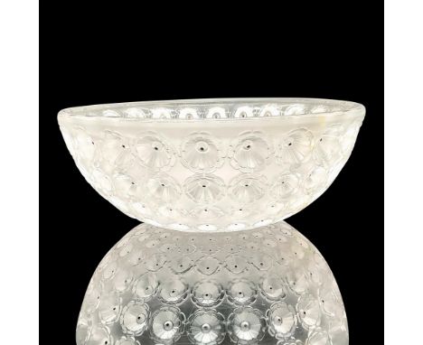 The Lalique Nemours Crystal Bowl unveils a vintage masterpiece with the design originating from 1929. This exquisite bowl is 