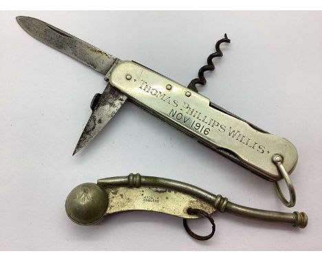 British Royal Navy Bosun Whistle, with broad arrow, metal pen knife with five blade types and corkscrew marked '15 Years of S