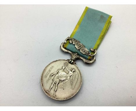 Crimean War British Crimea Medal HMS Queen with Sebastopol Clasp, awarded to R Wells NB HMS Queen. HMS Queen was a first rate