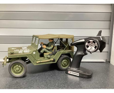A Plastic Model Radio Controlled U.S. Army 2E 4182 Willy's Jeep (Multi Utility Tactical Transport), with control unit, untest
