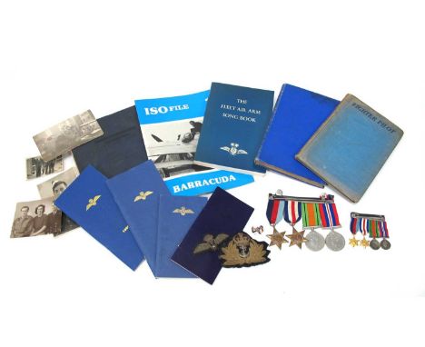 WWII RNVR Fleet Air Arm Log Book, Medal Group, comprising 1939 - 1945 Star, France and Germany Star, Defence Medal and War Me