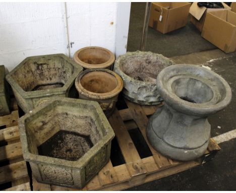 A collection of garden ware, to include a reconstituted stone font on stand, a pair of stone planters with Celtic knot design