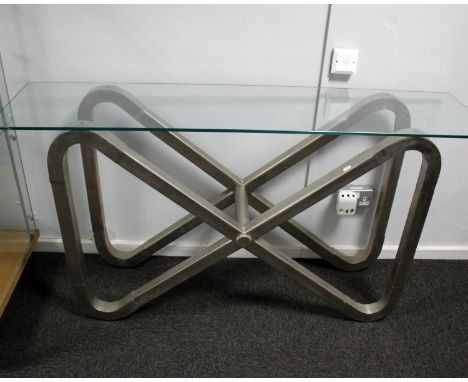 A pair of modern glass topped console tables on brushed steel eight shaped supports149cm(LW) 37cm(D) 78cm(H)