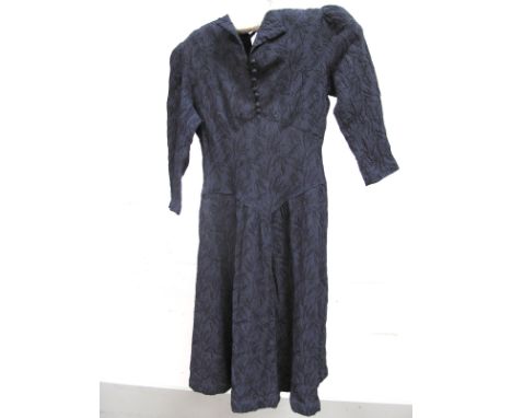 A 1940's Vintage Tea Dress, in navy blue crepe type fabric, with buttoned upper bodice, central fitted panel to gathered skir