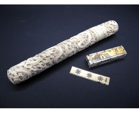 A Late XIX Century Chinese Ivory Needle Case, elaborately carved with sinuous dragons, birds and flowers, the cylindrical bod