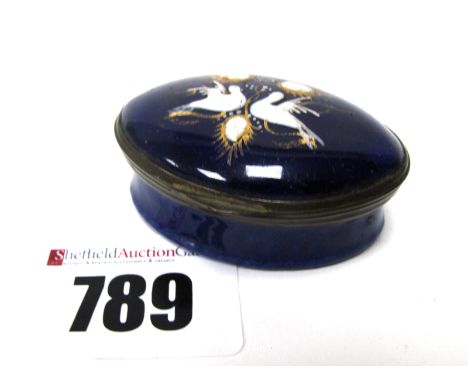 An XVIII Century South Staffordshire Enamel Patch Box, the lid painted with two doves on a mirrored interior, against a dark 