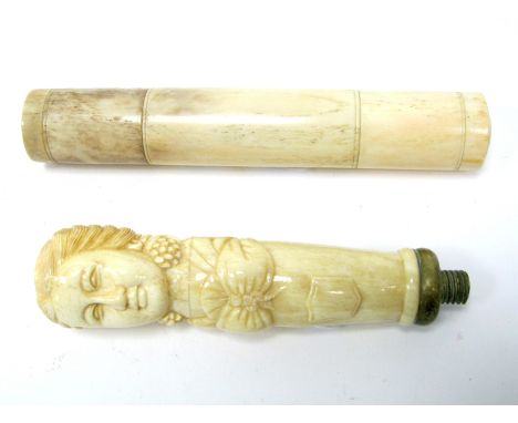 A Late XIX Century Carved Bone Parasol/Walking Stick Handle, carved as a lady wearing a shawl, screw attachment, 13.5cm long;