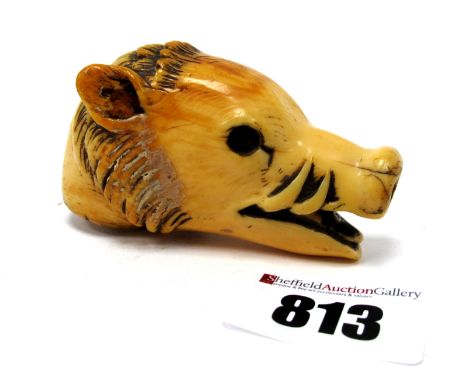 A Late XIX Century Ivory Walking Stick Handle, carved as a boar's head with open mouth, 7cm long.