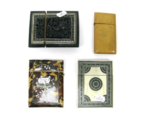 An Early XIX Century Tortoiseshell Card Case, inlaid in mother of pearl with a floral motif, 10cm long; an Anglo/Indian card 