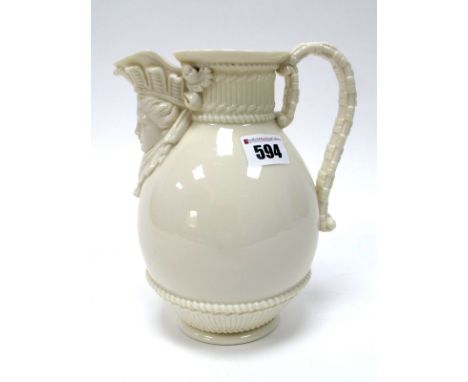 A Royal Worcester Porcelain Ewer, of ovoid form with basket weave moulded body and mask spout, puce mark, date code for 1886,