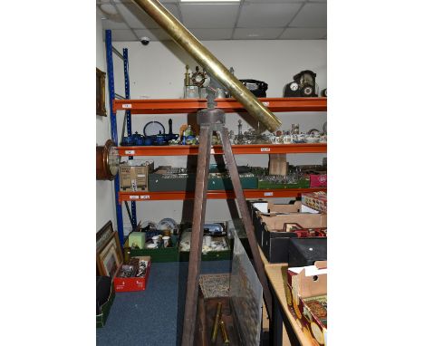 A LARGE BRASS VICTORIAN TELESCOPE ON A WOODEN TRIPOD STAND, with a wooden case and three lens, height 167cm to top of fitting