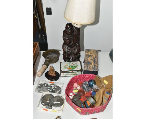 A COLLECTION OF ORIENTAL ITEMS, to include a Chinese silk iron with wooden handle, a collection of Chinese coins, a carved wo