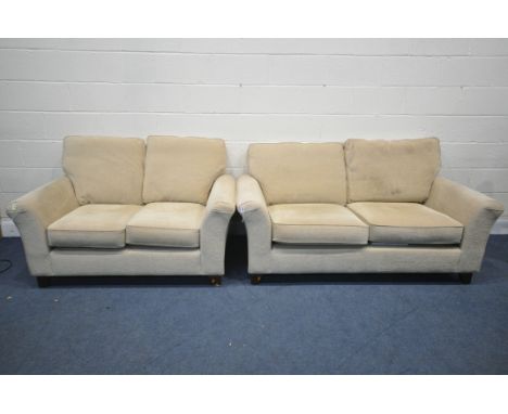 A MARKS AND SPENCER OATMEAL TWO PIECE SUITE, comprising a three seater sofa, width 177cm x depth 94cm x height 87cm, and a tw