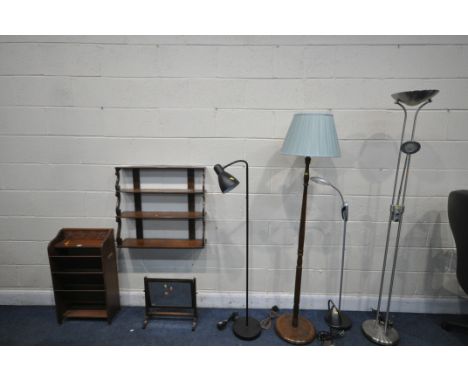 A SELECTION OF LAMPS, to include four various standard lamps, a table lamp, an oak three tier magazine rack, a four tier hang