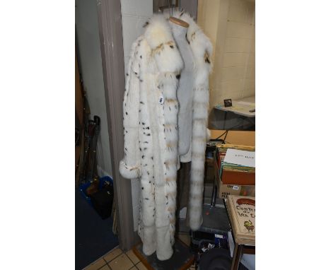 A MODERN FULL LENGTH REVERSIBLE LADIES FUR COAT, UK size 12/14, light brown suede on one side and white and brown spotted fur