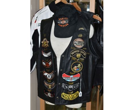 A GROUP OF HARLEY - DAVIDSON AND SIMILAR MOTORCYCLE LEATHERWARE, comprising a Harley-Davidson leather waistcoat with metal pi