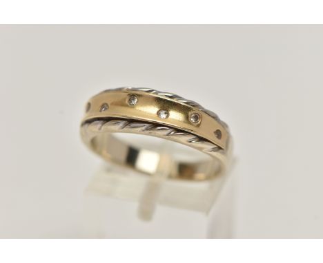 A BICOLOUR AND DIAMOND RING, seven round brilliant cut diamonds, flush set in yellow metal, with a white metal  twisted rope 